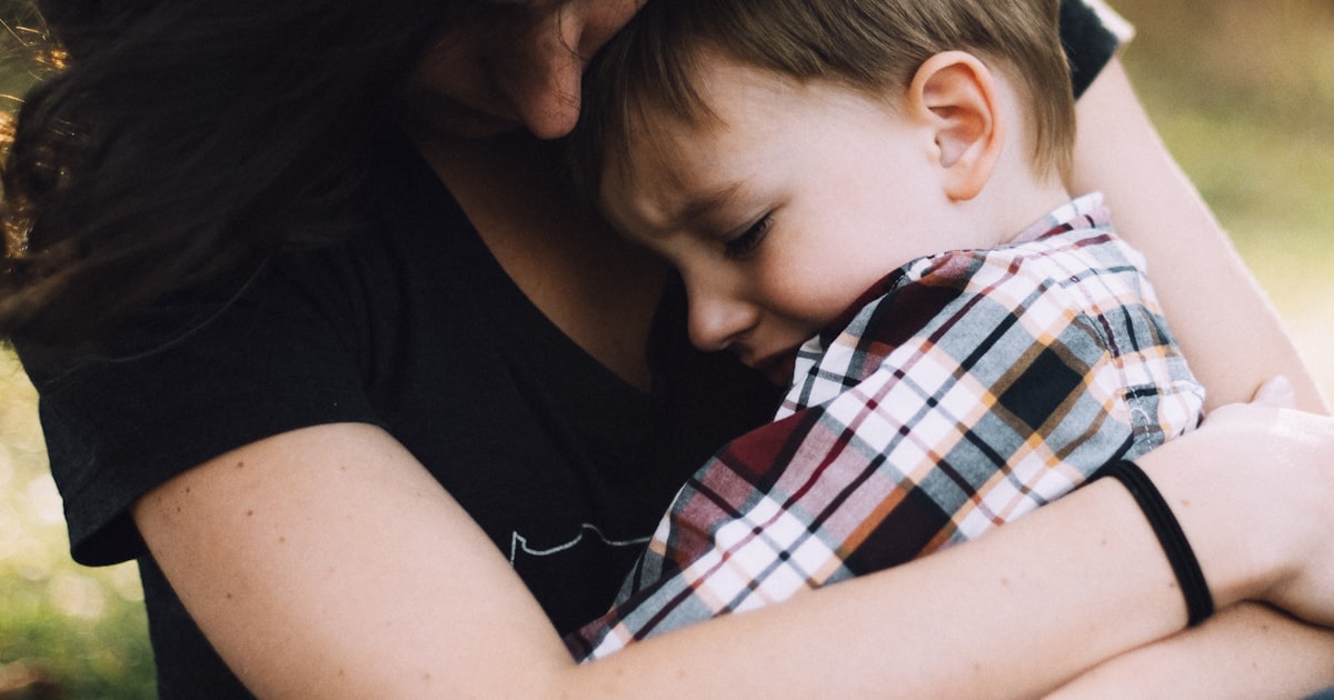 Leather scrapbook style heritage album with family photos and keepsakes